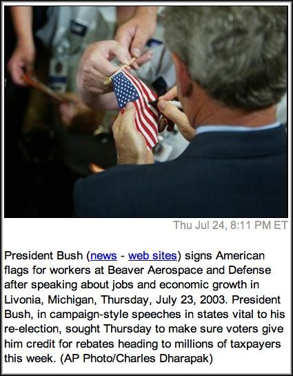 Bush defaces flag