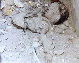 Body of an Iraqi child in the rubble