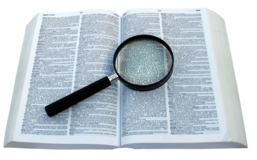 magnifying glass on book magnifying glass on book