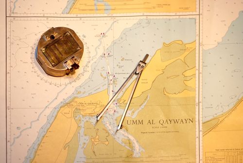 image of old map and compass image of old map and compass